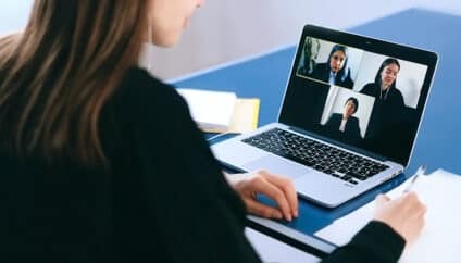 Woman working remotely on a video call for Accountability Resources Blog titled: Fostering Connection Among Remote Teams
